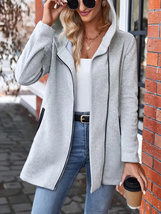 Brille con luz propia | Chaqueta con capucha y bolsillos con cremallera para mujer