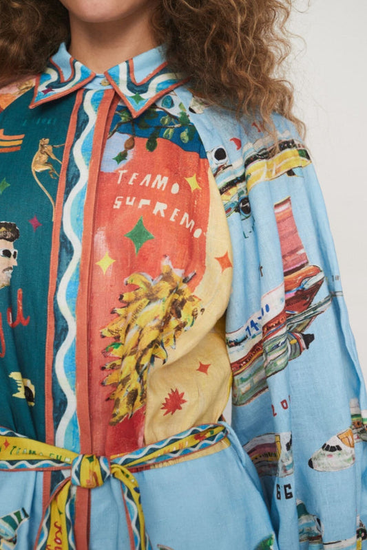 Deslumbra | Vestido camisero corto con estampado único, mangas abullonadas, cinturón y bolsillos