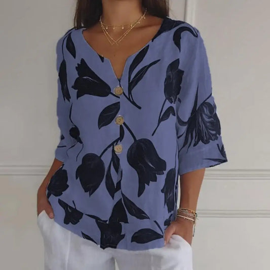 Brilla con luz propia | Blusa floral de cuello redondo para mujer