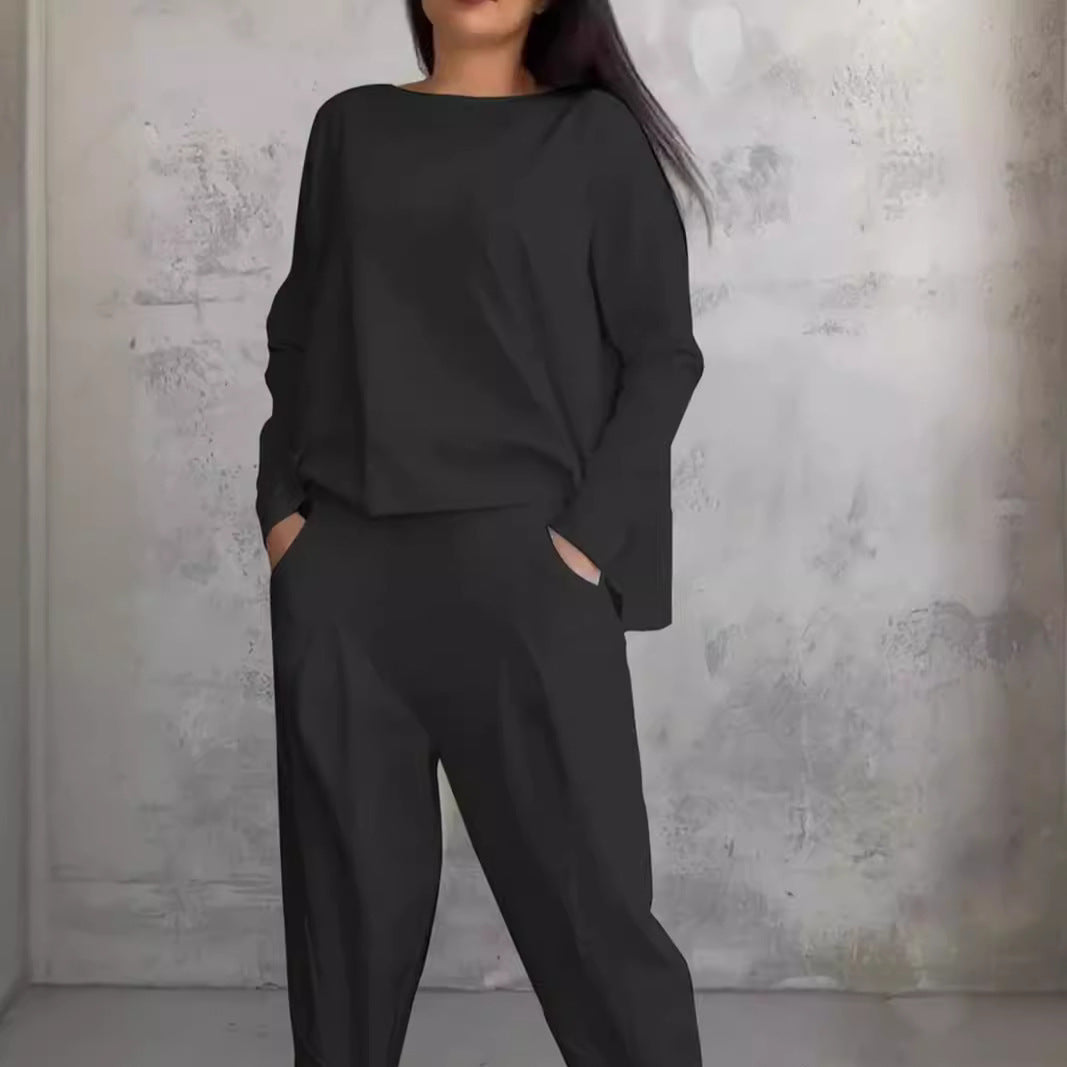 Brilla con luz propia | Traje pantalón liso de corte ajustado con cuello redondo