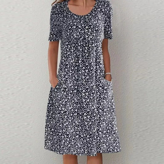 Deslumbra | Elegante vestido midi de manga corta con cuello redondo y bolsillos
