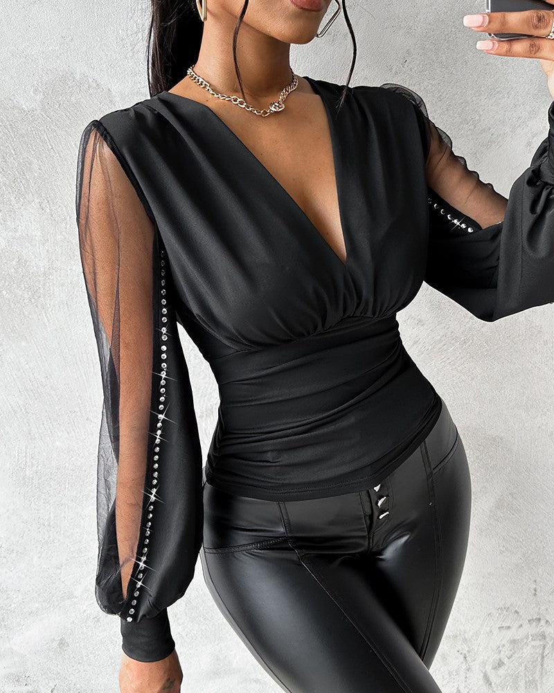 Deslumbra | Top fruncido con mangas abullonadas y escote pronunciado