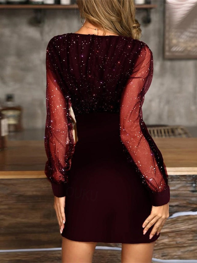 Deslumbra | Elegante vestido de cóctel con mangas largas de malla